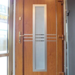 Drzwi wejściowe jednoskrzydłowe z wypełnieniem wsadowym Frohmasco Model 08-10, kolor Złoty dąb